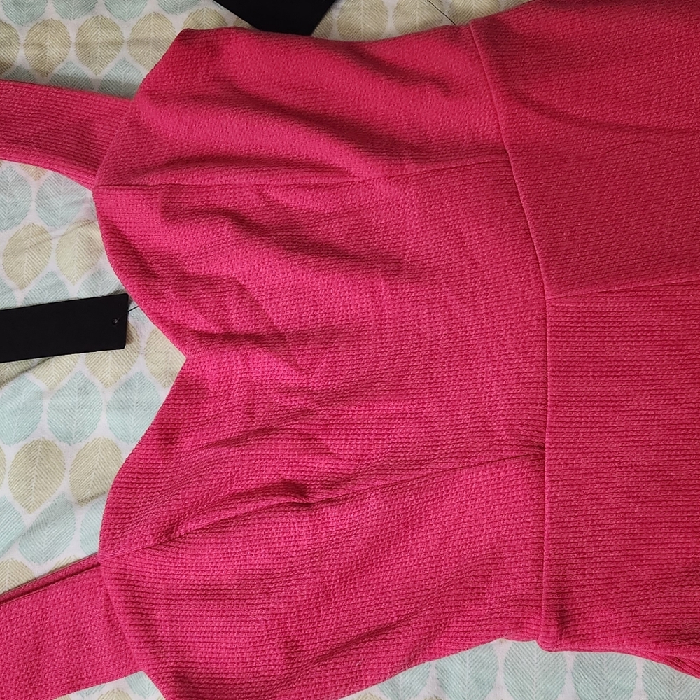 The red jumpsuit